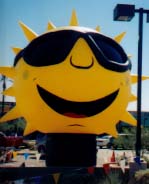 Sun advertising inflatables available for sale or rent. Many giant balloons and advertising inflatables for rent.